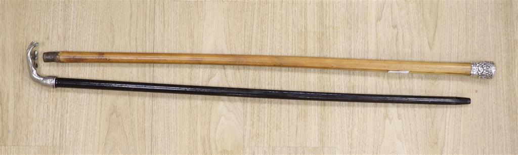 A Chinese silver-mounted malacca cane and a plate mounted ebonised stick